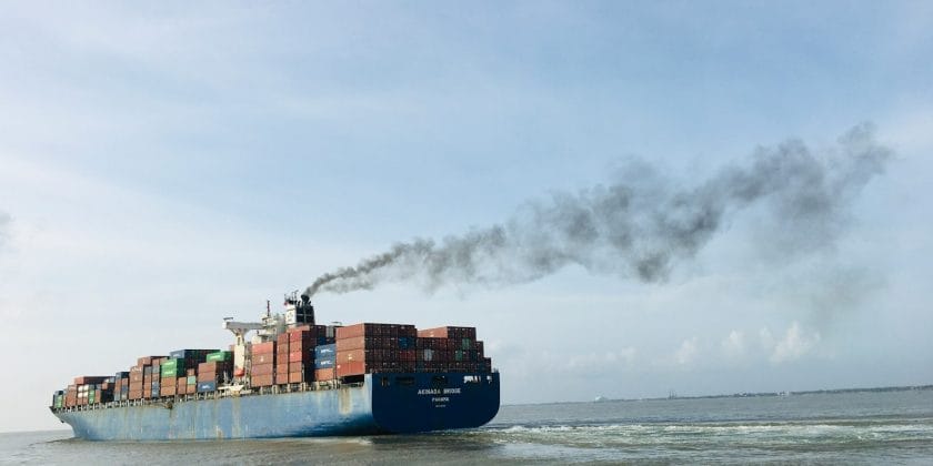 a large cargo ship with a lot of containers on it