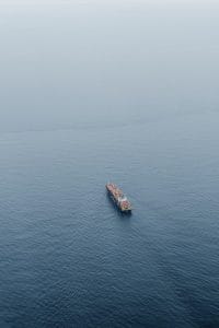 aerial view of boat on sea during daytime
